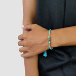 Lucky gemstone bracelet turquoise tassel on model