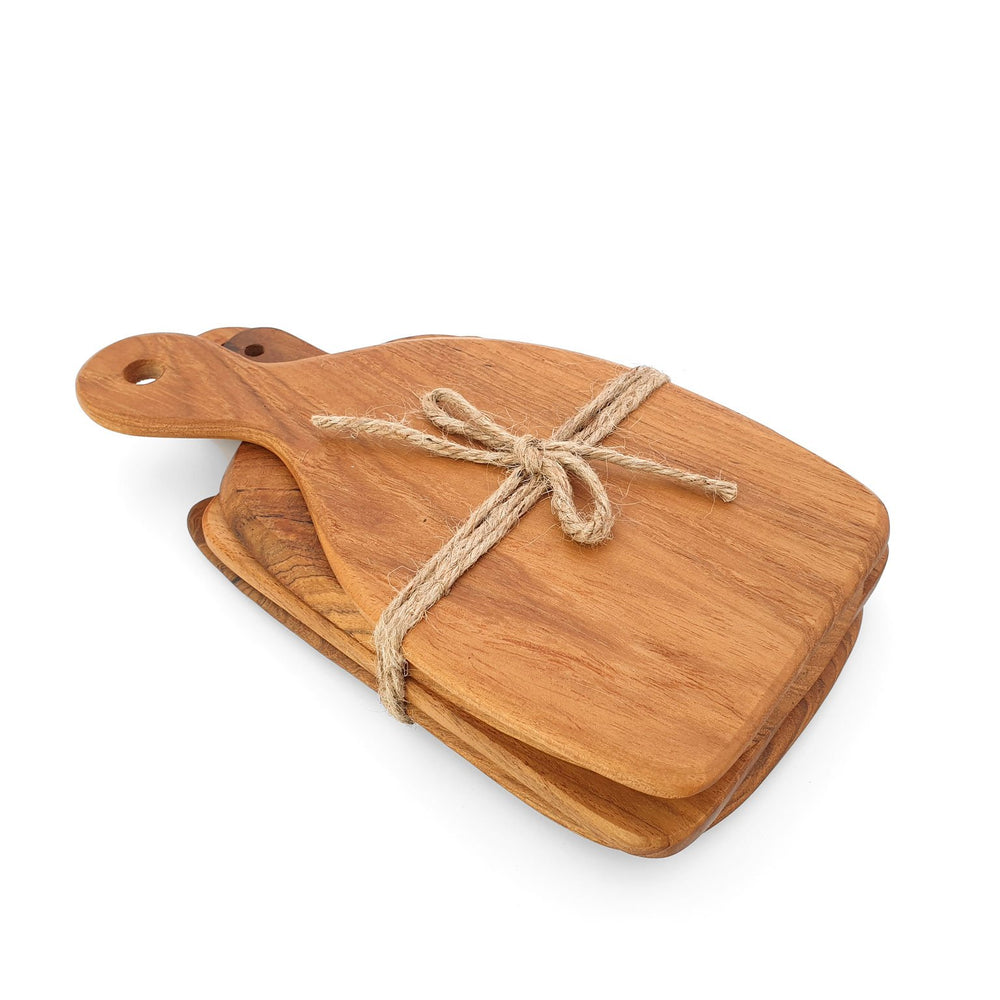 
                  
                    Load image into Gallery viewer, Wooden cheese boards in 4 different shapes made of teak in a set side view
                  
                