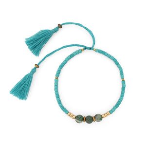 
                  
                    Load image into Gallery viewer, Lucky gemstone bracelet turquoise tassel front view
                  
                