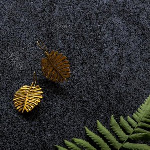 
                  
                    Load image into Gallery viewer, monstera dangle earring golden boho tropical jewelry
                  
                