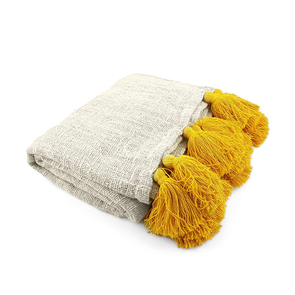
                  
                    Load image into Gallery viewer, Handmade boho Cotton blanket with yellow tassel cream color side view
                  
                