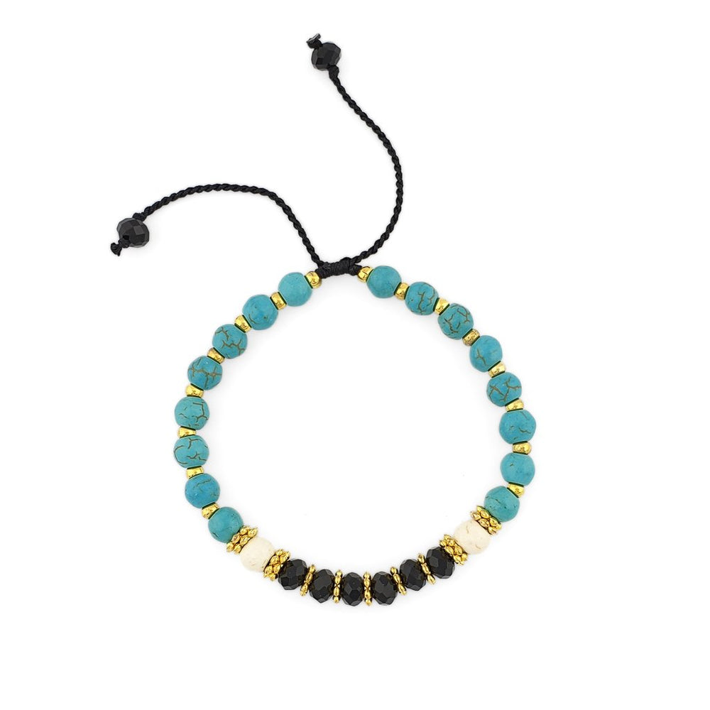 
                  
                    Load image into Gallery viewer, Turquoise Bracelet with gold beads and black crystals
                  
                