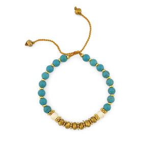 
                  
                    Load image into Gallery viewer, Turquoise Bracelet with gold beads and gold crystals
                  
                