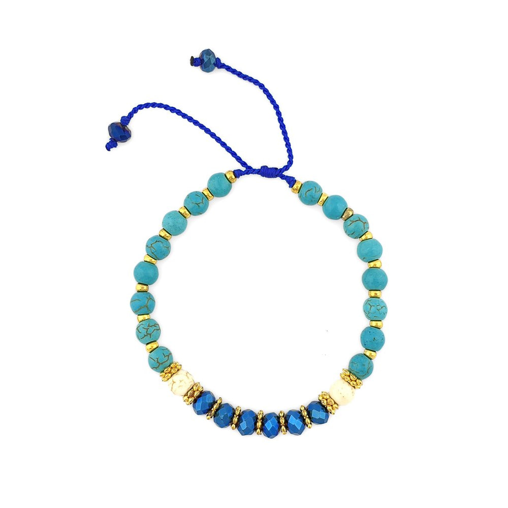 
                  
                    Load image into Gallery viewer, Turquoise Bracelet with gold beads and navy crystals
                  
                