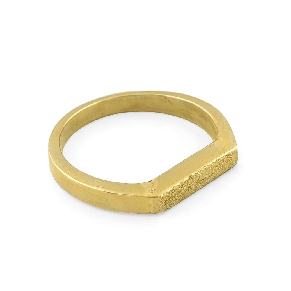 
                  
                    Load image into Gallery viewer, Brass gold color ring with flat and hammered front surface top view
                  
                