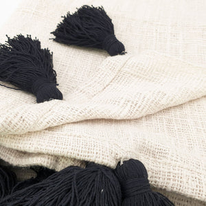 
                  
                    Load image into Gallery viewer, Handmade boho Cotton blanket with black tassel cream color detail
                  
                