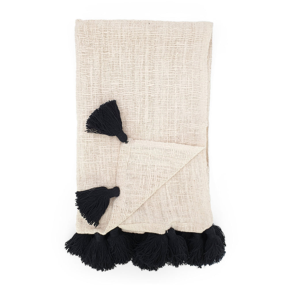 Handmade boho Cotton blanket with black tassel cream color front view