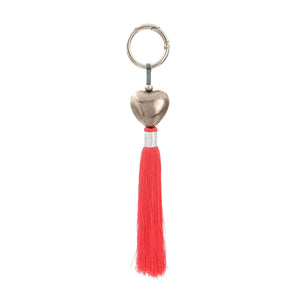 
                  
                    Load image into Gallery viewer, Keychain brass heart silver plated with fuchsia tassel
                  
                