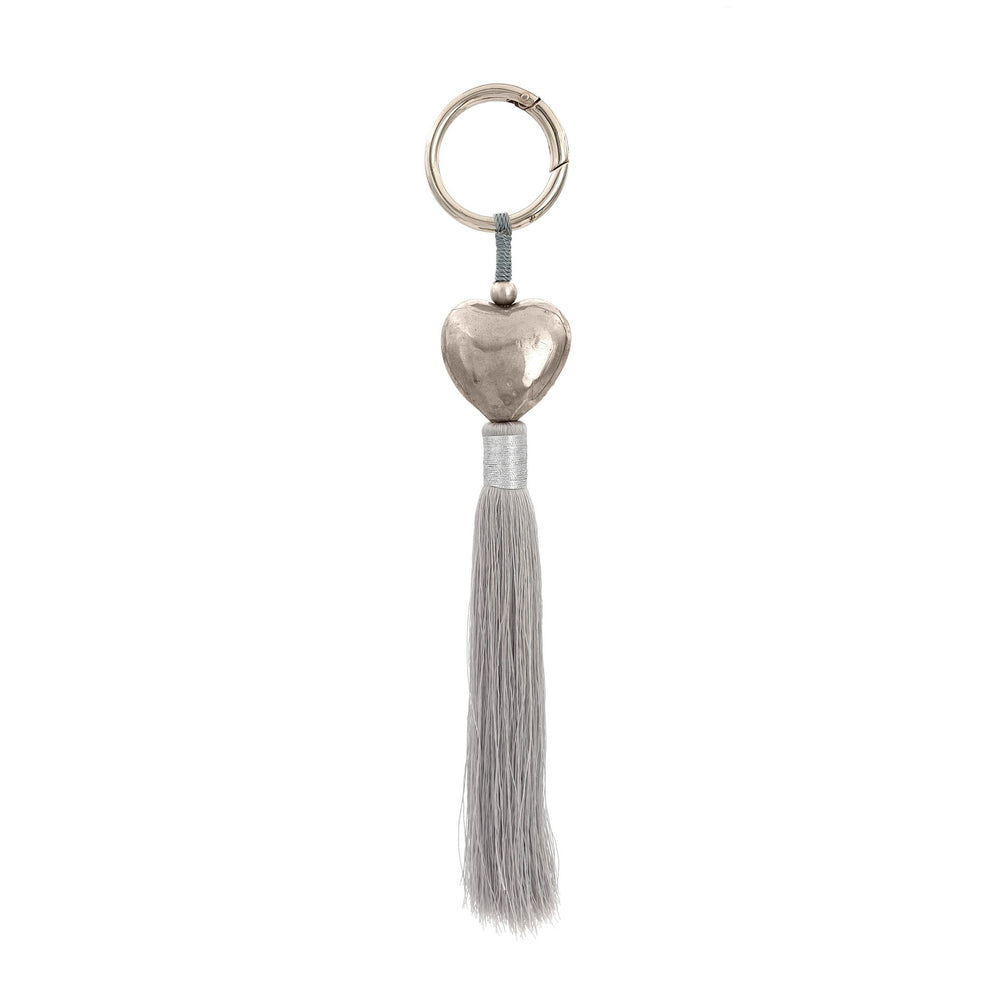 
                  
                    Load image into Gallery viewer, Keychain brass heart silver plated with grey tassel
                  
                