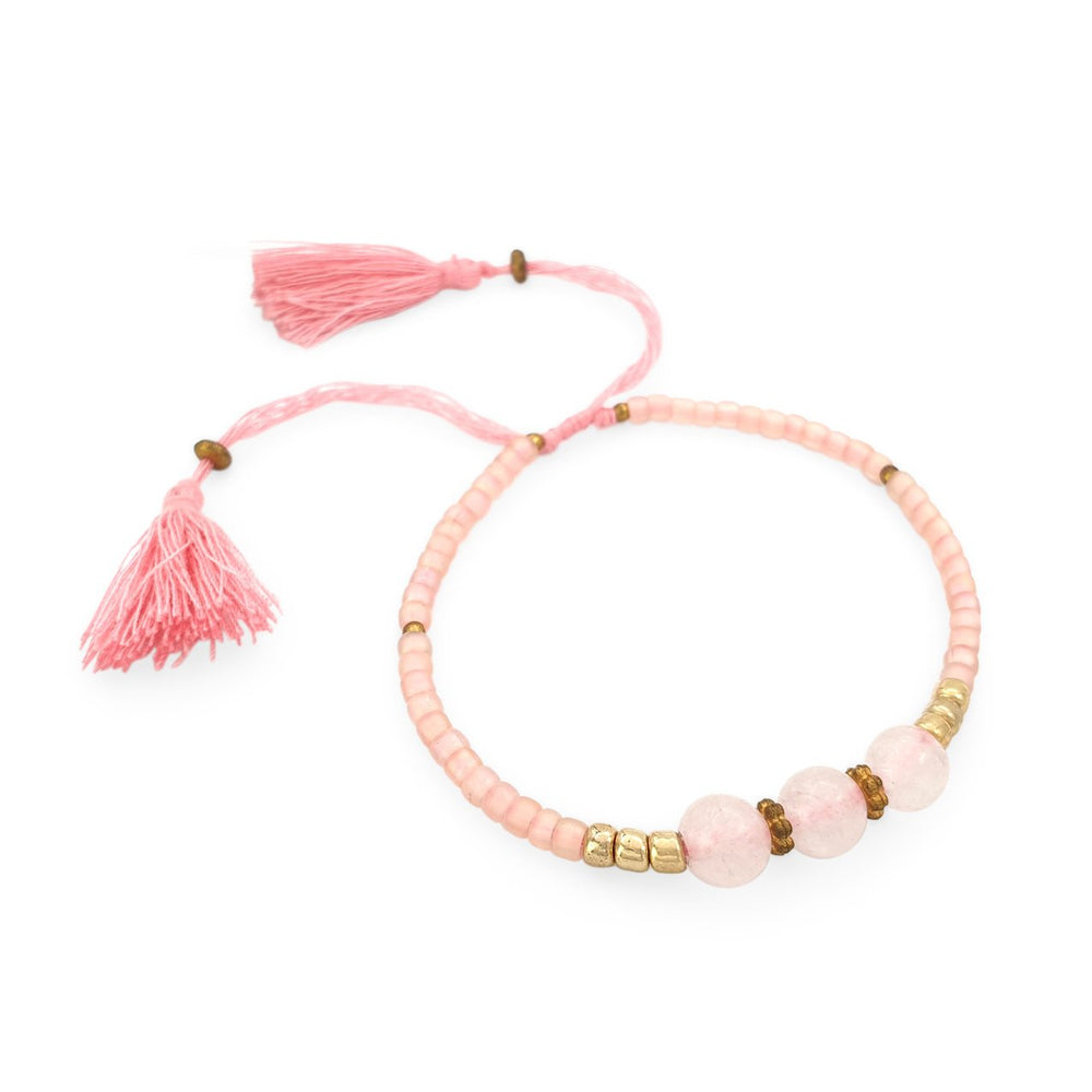 
                  
                    Load image into Gallery viewer, Lucky gemstone bracelet blush pink tassel side view
                  
                