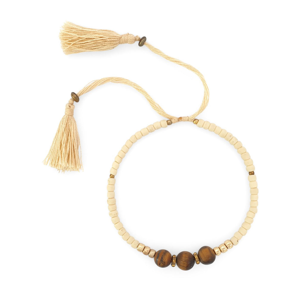 
                  
                    Load image into Gallery viewer, Lucky gemstone bracelet cream tassel front view
                  
                