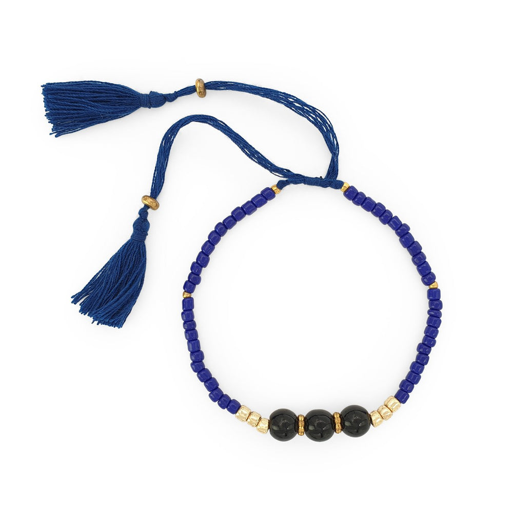 
                  
                    Load image into Gallery viewer, Lucky gemstone bracelet dark blue tassel front view
                  
                