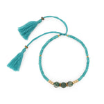 Lucky gemstone bracelet turquoise tassel front view