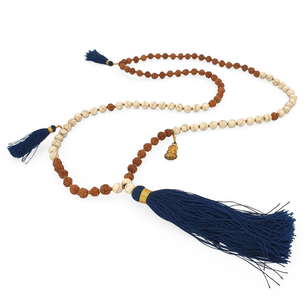 
                  
                    Load image into Gallery viewer, Handmade Buddha rudraksha and howlite mala necklace with navy tassel angle
                  
                