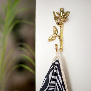 
                  
                    Load image into Gallery viewer, Solid brass wall hook bird on a branch on the wall
                  
                