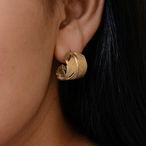 
                  
                    Load image into Gallery viewer, Earring Feather Antique Stud Gold on Model
                  
                